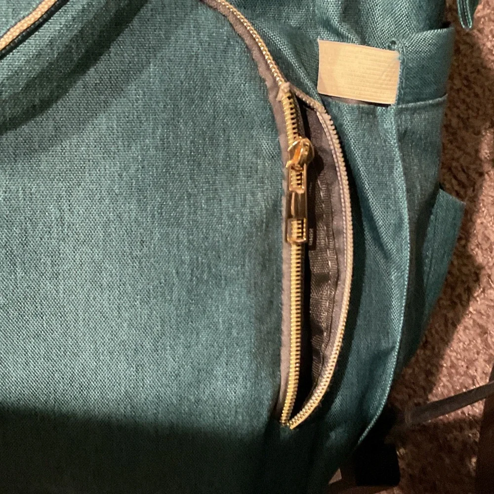 Land Traveling Share Backpack Teal
